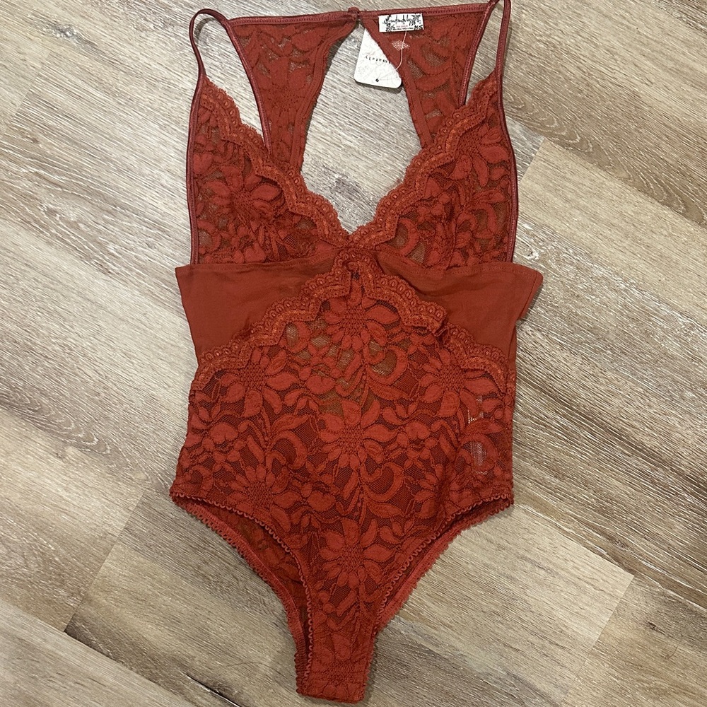 Free People Intimately Lace Bodysuit in burnt orange